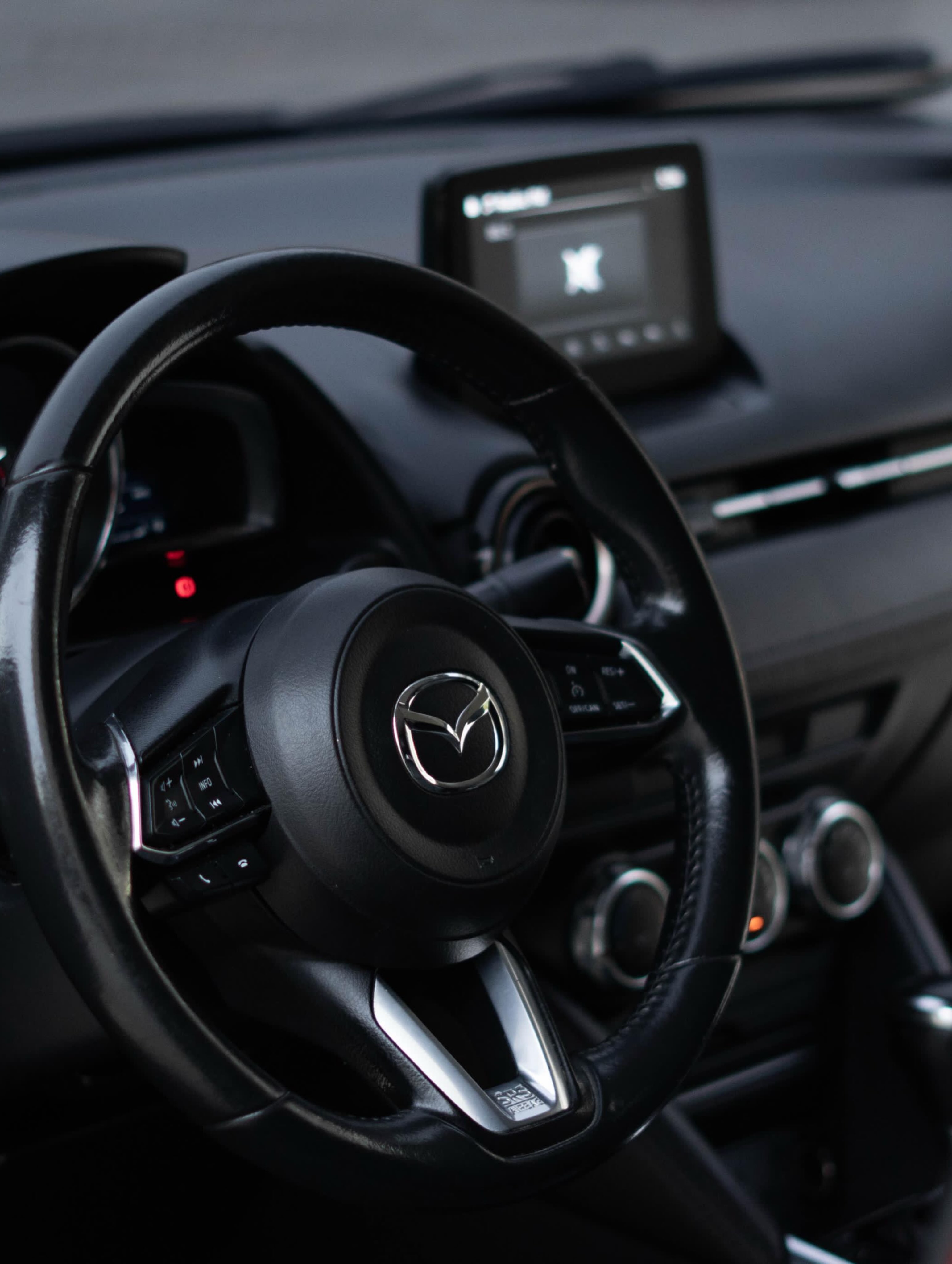 Mazda 2 Grand Touring LX 2020, vista lateral